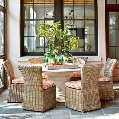 Wonderful way to provide shade for the dining space outdoors [Design: Samuel H