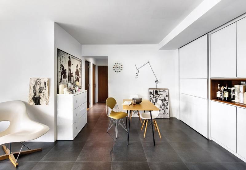 contemporary dining room by JAUREGUI Architecture Interiors Construction Round table, rug and upholstered chairs