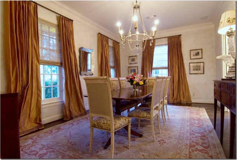 bay windows and grey curtains